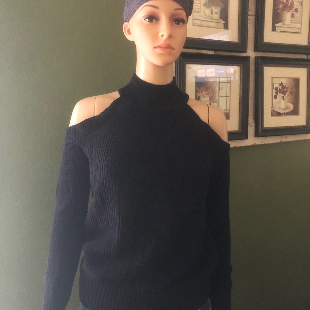 Black pullover sweater with cut-out shoulders
